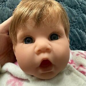 FAO Schwarz Doll with Soft Brown Hair and Blue Eyes